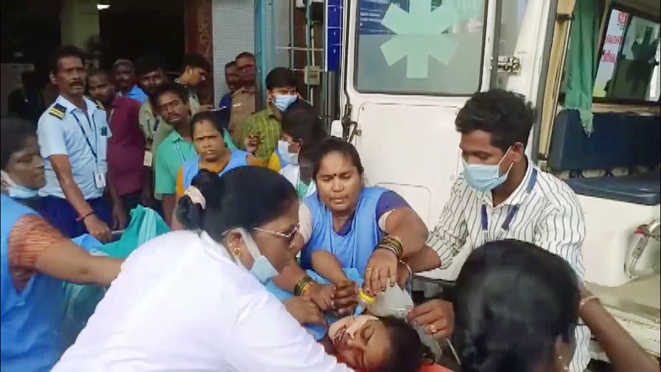 Emergency personnel and medical teams outside the private fish meal export factory in Kannigaipair village following a hazardous ammonia gas leak.