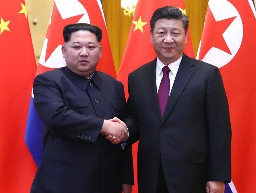 Xi arrives in North Korea on first visit in 7 years