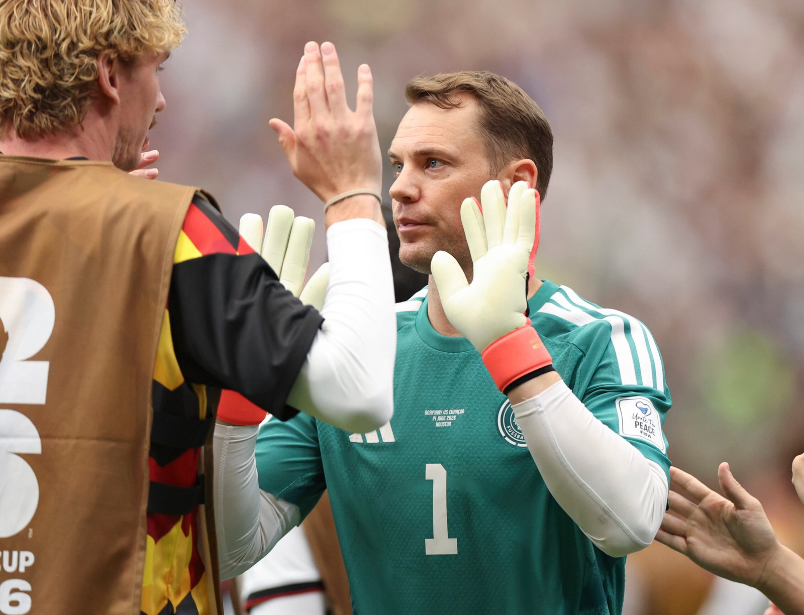 Germany and Ivory Coast players challenge for possession during a FIFA World Cup 2026 Group E match, with both teams competing for a crucial victory in the race to qualify for the knockout stage.