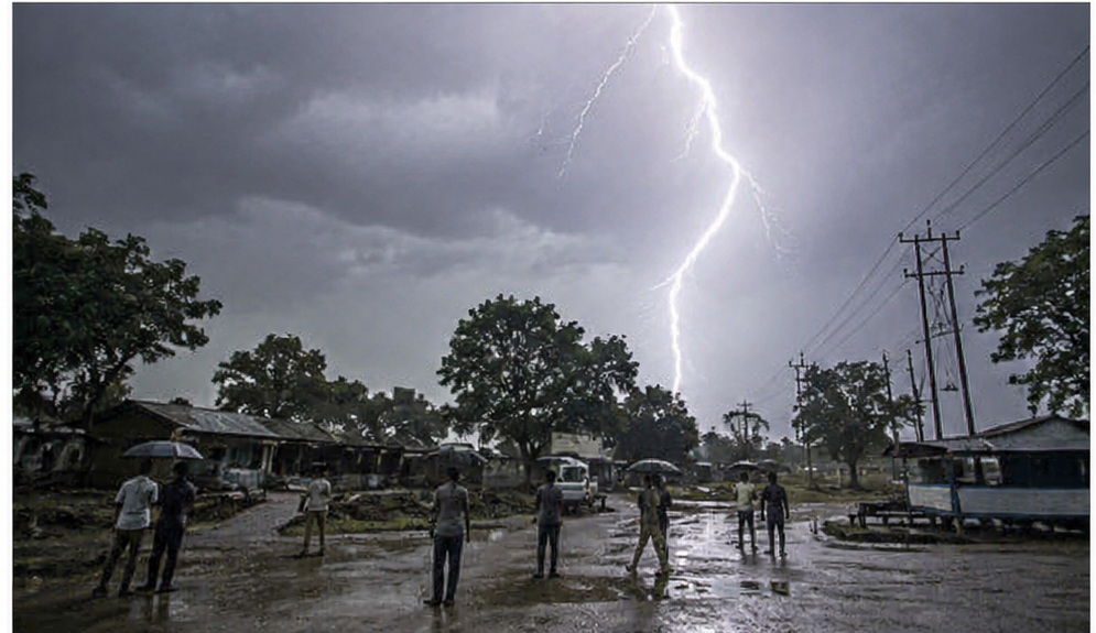 Rescuers and local authorities assisting lightning strike victims in rural Jharkhand, emphasizing monsoon safety awareness.