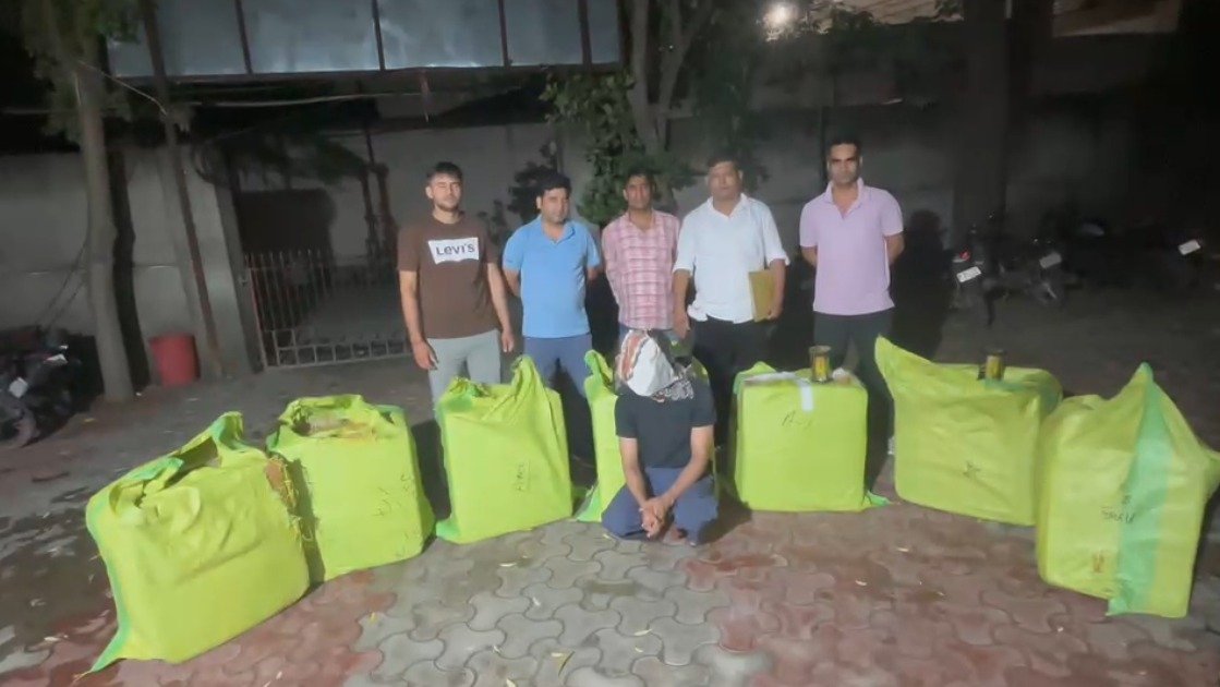 Delhi Police Special Staff displaying seized cartons of banned Chinese manjha reels