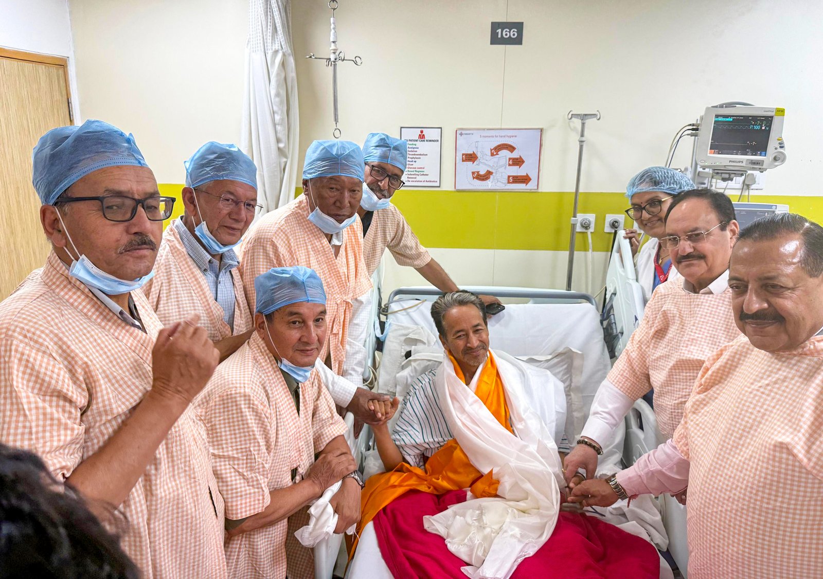 Activist Sonam Wangchuk in hospital surrounded by government officials after ending his 26-day fast
