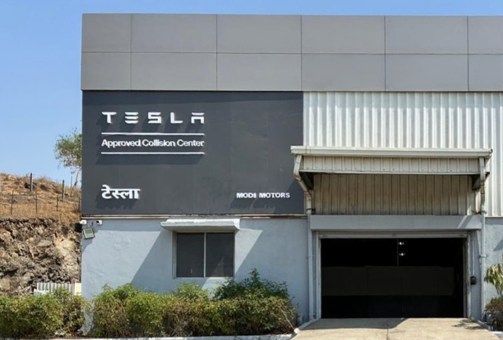Tesla 2026 Model Y parked outside the new authorised Tesla body shop facility in Pune Maharashtra