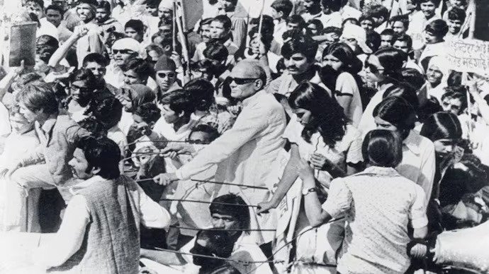 Historic demonstration showing university students marching with banners for civil rights, democracy, and systemic political reform