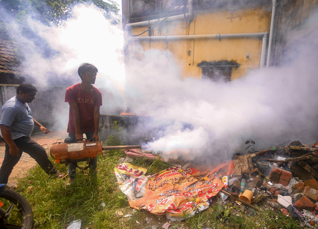 healthcare workers conducting fever screenings and fogging in chennai.jpg