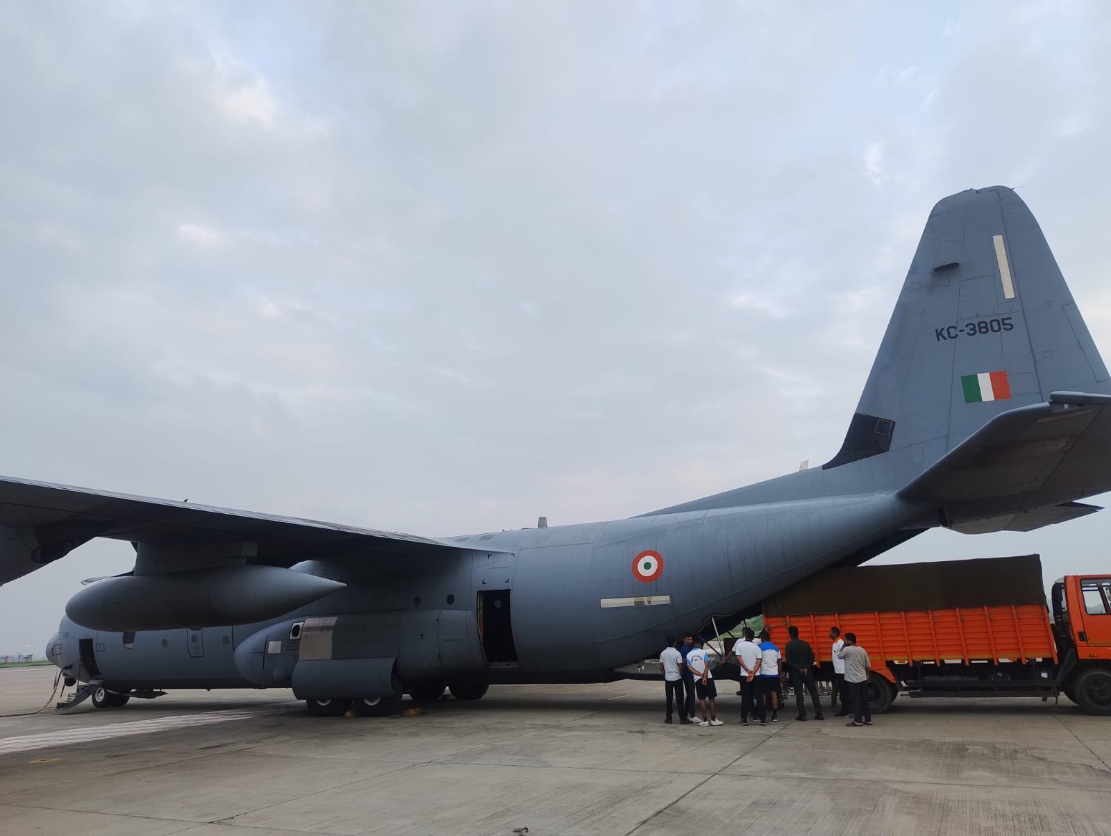 Indian Air Force transport aircraft being loaded with emergency medicines and rescue gear bound for Nepal