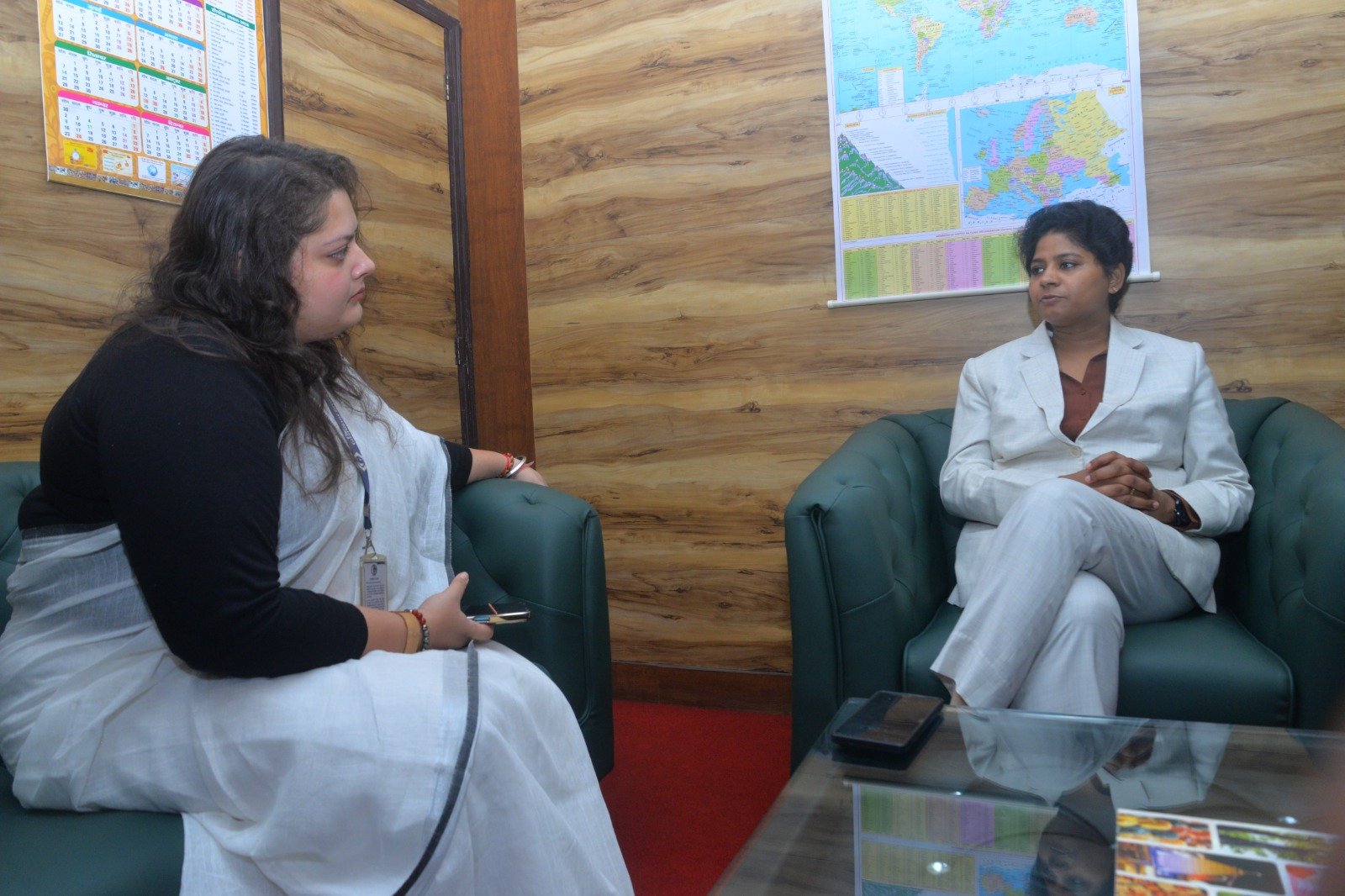 Indian Foreign Service officer in conversation discussing diplomatic postings and crisis evacuations