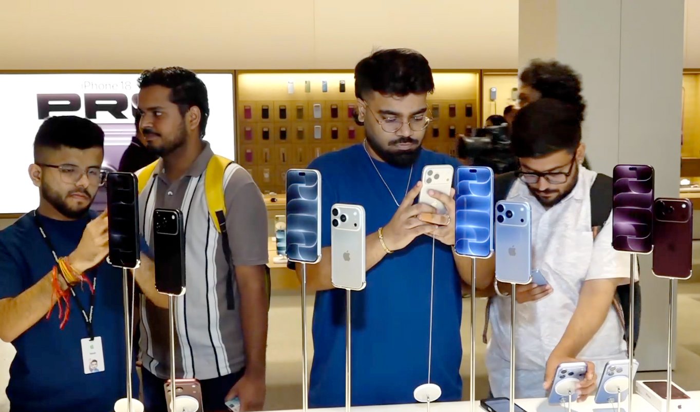 Customers line up outside an Apple Store in New Delhi as the iPhone 18 Pro and iPhone 18 Pro Max officially go on sale across India on Friday.